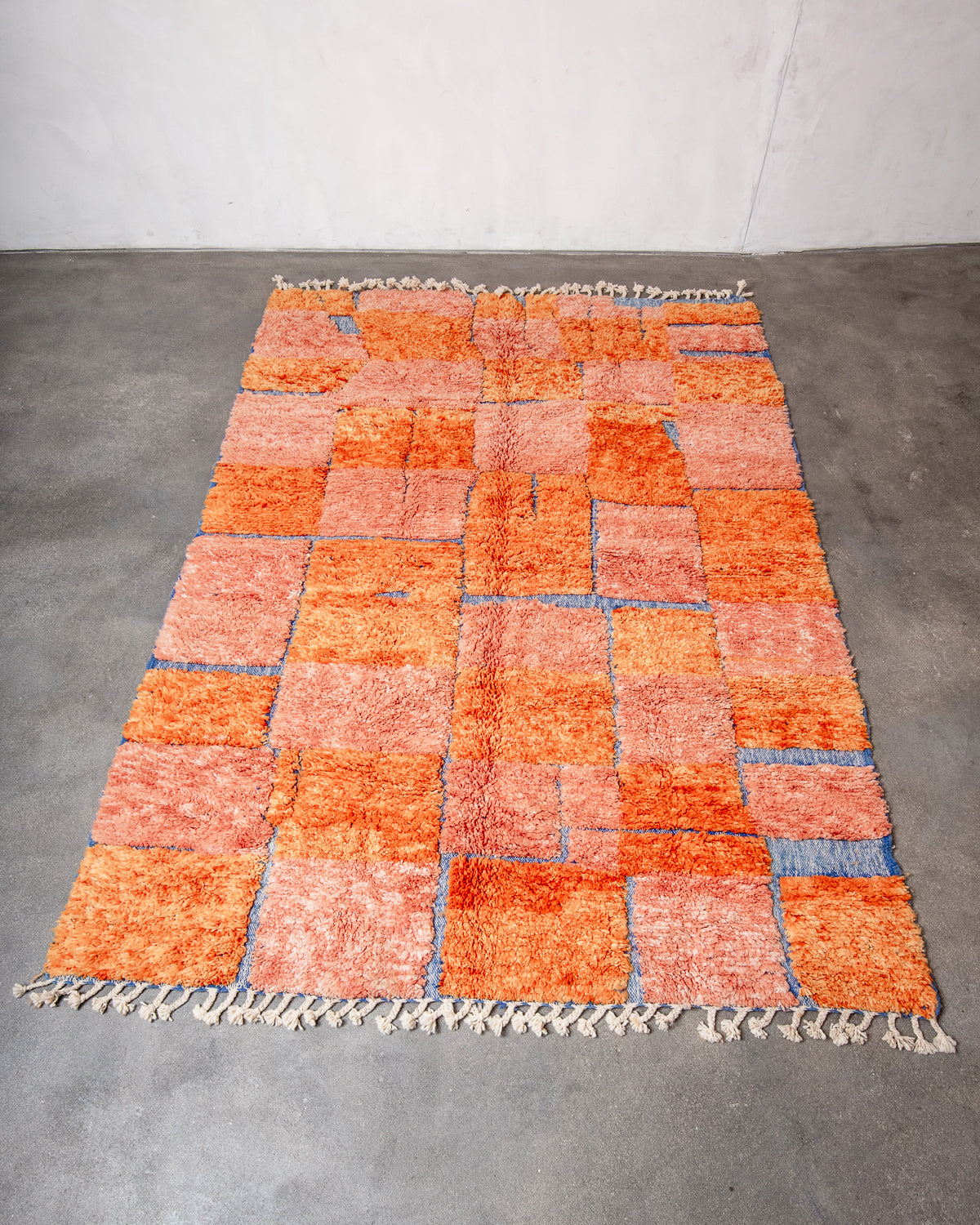 Modern, designer, handcrafted Berber rug from Morocco. Beniourain carpet with beautiful colours and patterns and fluffy wool texture.